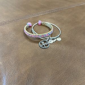 Alex and Ani silver bracelet with tennis racquet charm